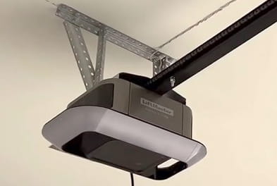 Installed LiftMaster chain drive garage door opener with integrated LED lighting.